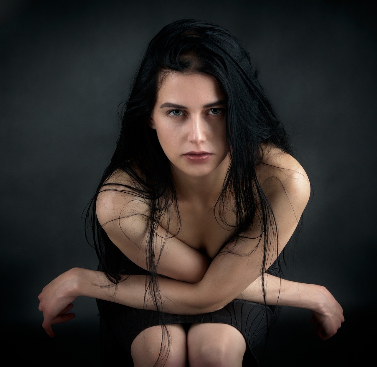 žena